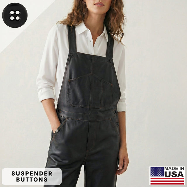 Woman wearing black leather overalls and a white shirt, featuring Made in USA and Suspender Brace Pant Buttons labels. The overalls include durable military spec Suspender Brace Pant Buttons, ideal for pairing with button-on suspenders to create a classic look.