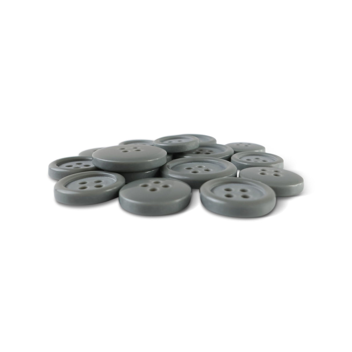 A pile of Basic Suit Buttons, gray with four holes and made from poly-nylon, arranged on a white background.