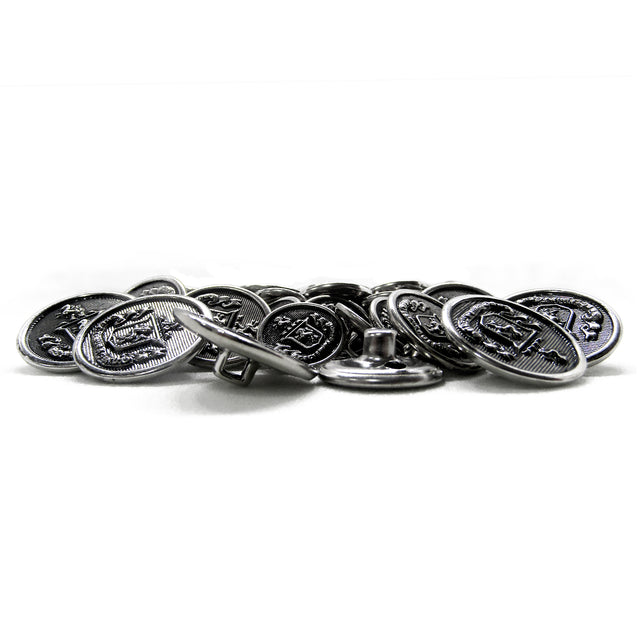 Lion Crest Design Metal Blazer Buttons, featuring embossed silver designs, are shown scattered on a white surface.