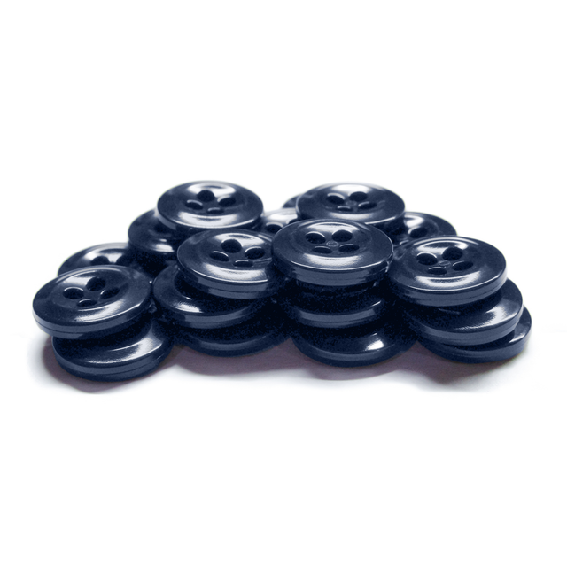A stack of black, four-hole Work Shirt Buttons made from military-grade plastic is arranged on a white background.