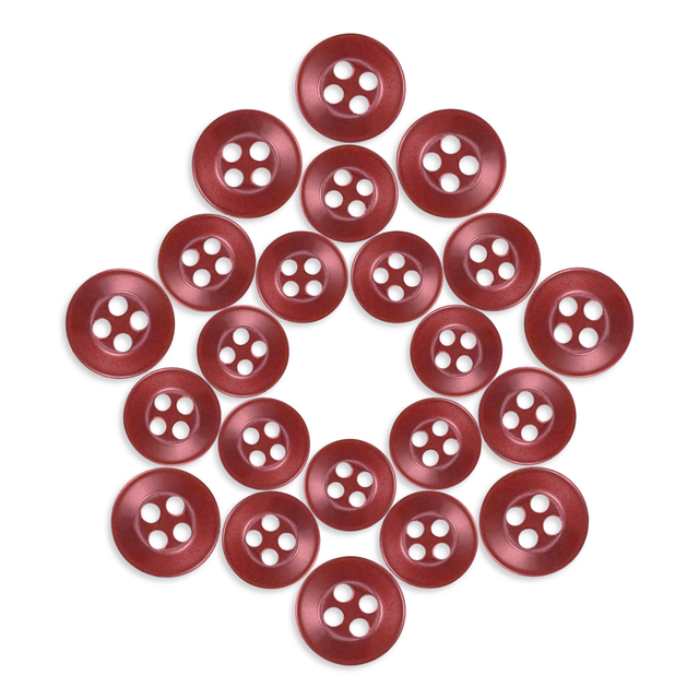 Replacement Shirt Buttons in red poly-nylon, featuring a symmetrical circular star pattern on a white background.