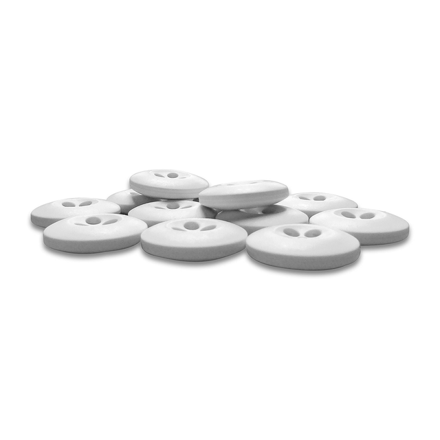 A pile of round, white ceramic Tactical Buttons, each with two holes like uniform buttons, is arranged on a plain white background.