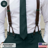 A man in a white shirt, green tie, and pants is wearing brown button-on suspenders attached with authentic Suspender Brace Pant Buttons, made in the USA.