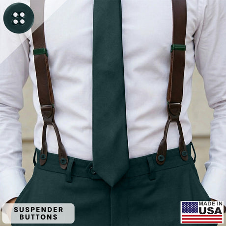 A man in a white shirt, green tie, and pants is wearing brown button-on suspenders attached with authentic Suspender Brace Pant Buttons, made in the USA.