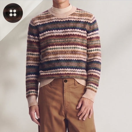 A person stands against a neutral background wearing a patterned sweater and tan pants designed with Khakis, Chinos and Casual Cotton Pant Buttons.