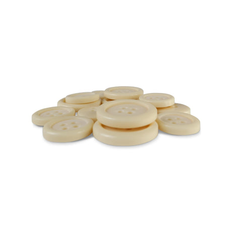 A pile of Basic Suit Buttons in beige, round and four-hole design is displayed on a white background.