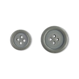 Two Basic Suit Buttons in gray, featuring four holes and different sizes, made from durable poly-nylon, displayed on a white background.