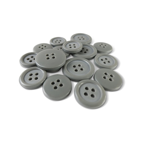 A pile of Basic Suit Buttons—assorted gray poly-nylon blazer buttons with four holes—on a white background.