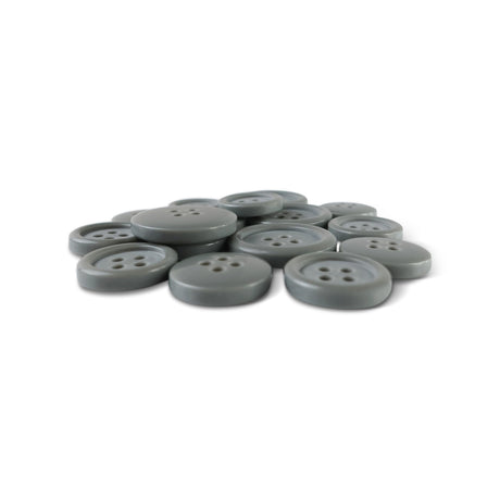 A pile of Basic Suit Buttons, gray with four holes and made from poly-nylon, arranged on a white background.
