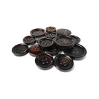 A set of dark brown and black Buffalo Horn Suit Buttons, ideal for luxury coats or suits, displayed on a white background.