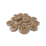 A set of Basic Suit Buttons in beige, featuring four holes, displayed on a white background.
