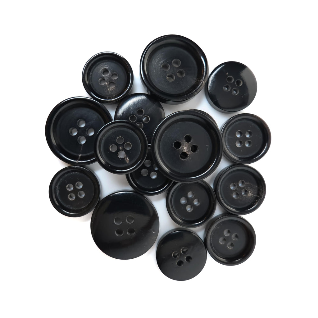 Buffalo Horn Suit Buttons in assorted sizes are grouped together on a white background.