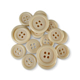 A collection of Basic Suit Buttons in assorted beige poly-nylon with four holes is displayed on a white background.