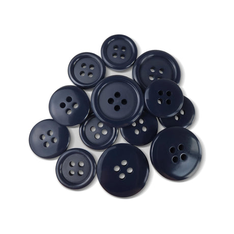 A selection of Basic Suit Buttons in dark blue poly-nylon, each with four holes and in assorted sizes, is displayed on a white background.