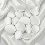 Tuxedo Suit Buttons: Round white satin buttons displayed on smooth, shiny white satin fabric—ideal for accenting formalwear or complementing elegant tuxedo attire.