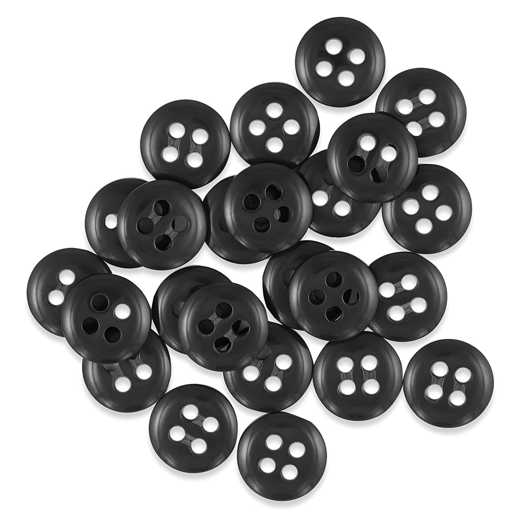 A pile of black Trouser Fly Pant Buttons with four holes scattered on a white background.