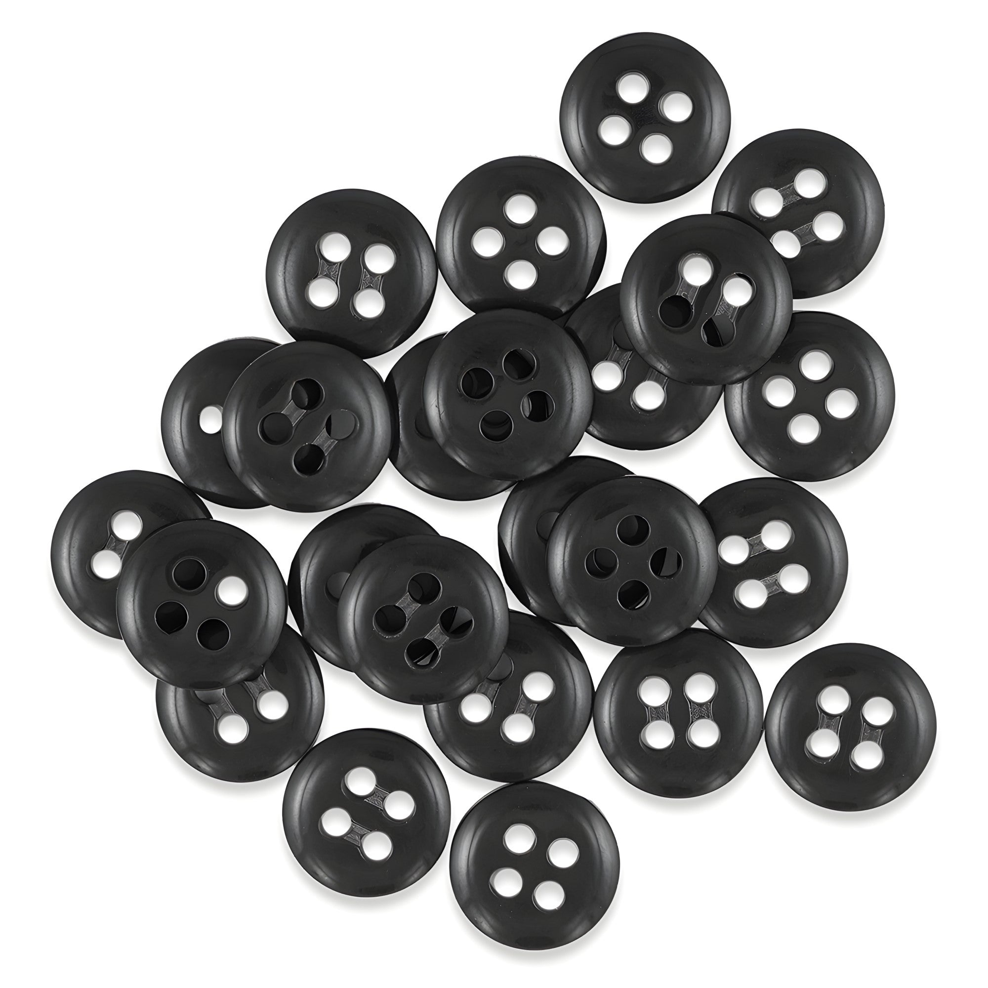 A pile of black Trouser Fly Pant Buttons with four holes scattered on a white background.
