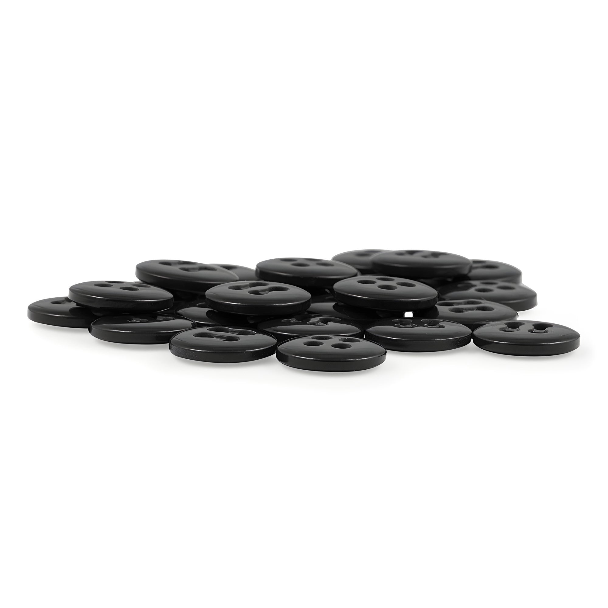 A pile of Trouser Fly Pant Buttons—small, round, navy, four-hole buttons—arranged on a white surface, perfect as garment replacement buttons.