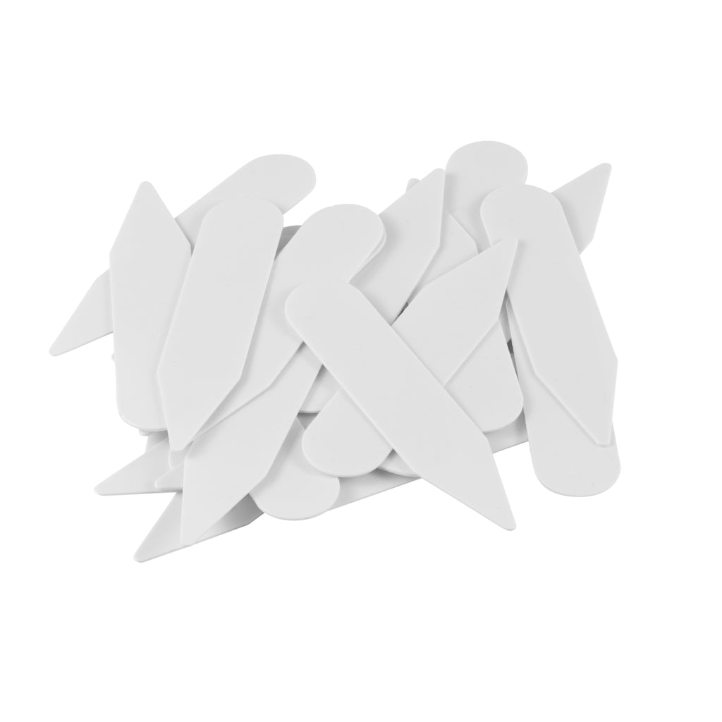 Collar Stays scattered on a white background provide essential support to keep shirt collars crisp and in place.