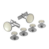 Tuxedo Shirt Studs and Cufflinks feature stainless steel with round ivory-colored centers, ideal as tuxedo shirt accessories. Shown against a white background.