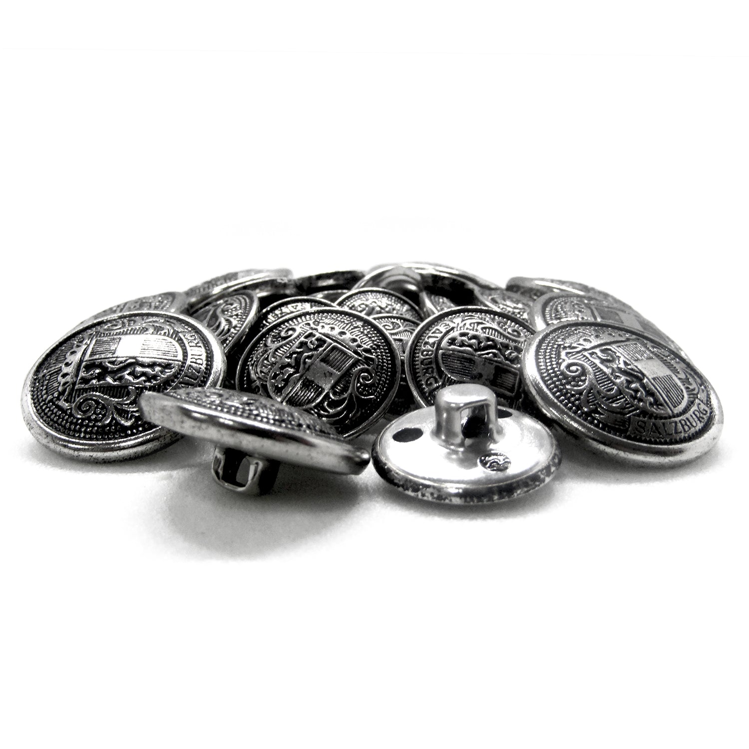 A pile of Salzburg Crest Design Metal Blazer Buttons with ornate silver detailing and shanks is arranged on a white background.