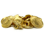 A pile of Salzburg Crest Design Metal Blazer Buttons featuring embossed patterns and back shanks, perfect as blazer replacements or for adding a stylish touch.