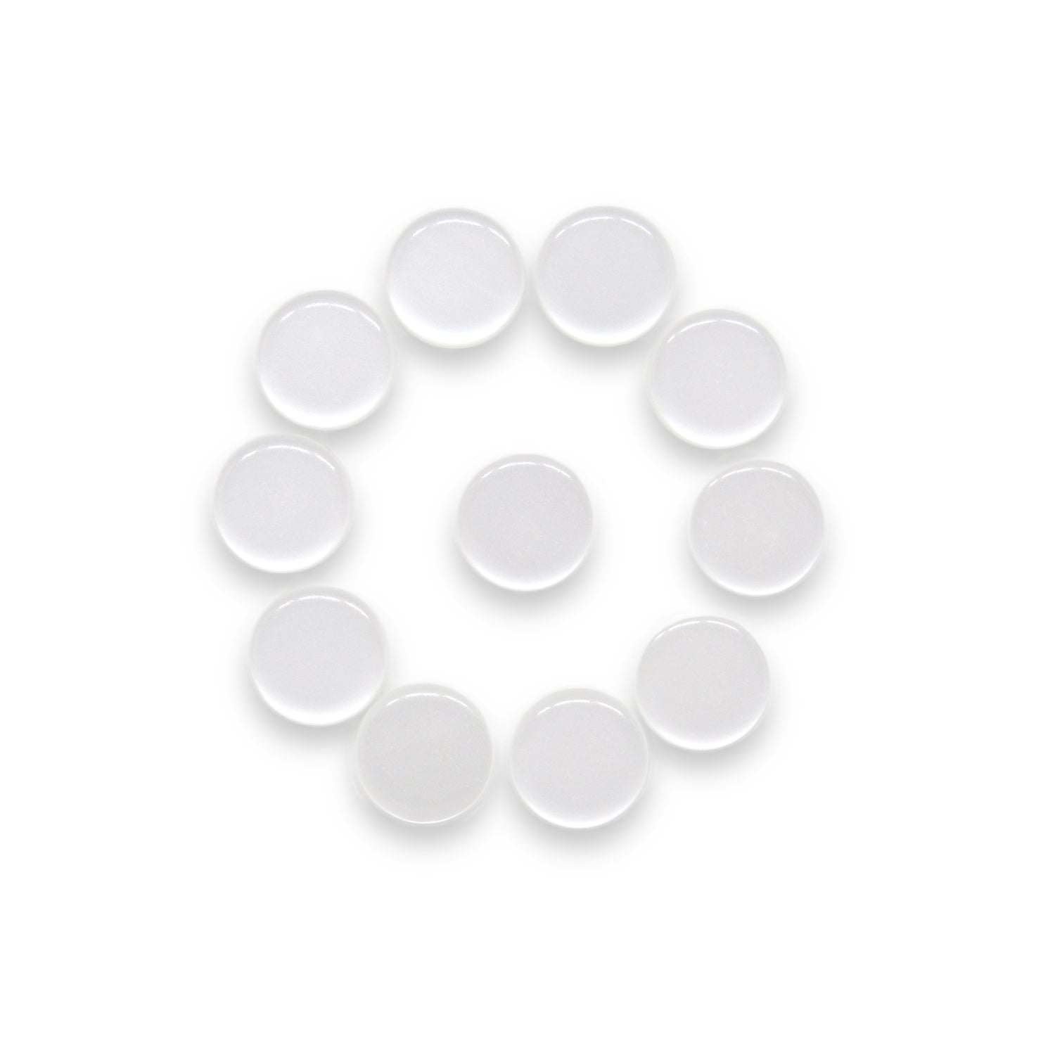 Twelve Flat Bridal Trim and Bustle Buttons, clear and round like wedding dress buttons, are arranged in a circle around one central button on a white background.