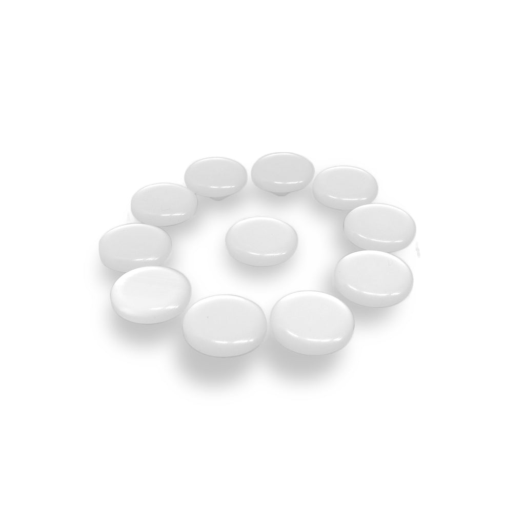 Eleven Flat Bridal Trim and Bustle Buttons, round and white like wedding dress buttons, are arranged in a circle around one button on a white background.