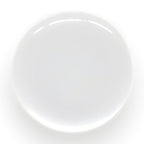 A set of flat, round, white bridal trim and bustle buttons is photographed from above on a white background, echoing the classic simplicity of wedding dress details.