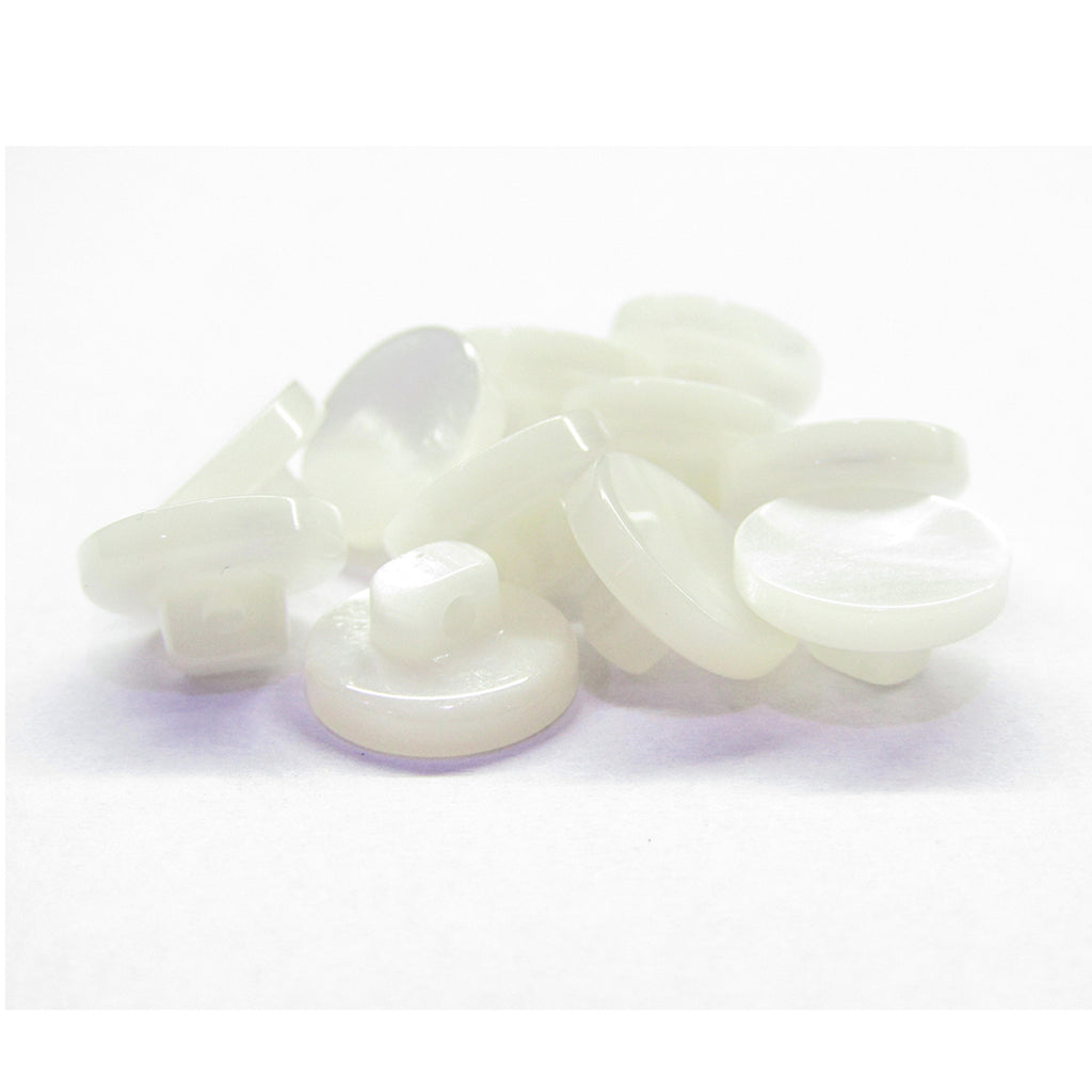 A pile of small, round, white Flat Bridal Trim and Bustle Buttons on a plain white background.