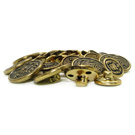 A stack of Lion Crest Design Metal Blazer Buttons with embossed detailing rests on a white background, ideal as stylish replacement blazer buttons.
