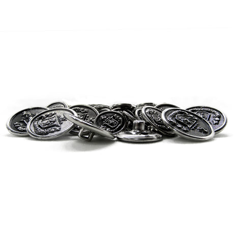 Lion Crest Design Metal Blazer Buttons, featuring embossed silver designs, are shown scattered on a white surface.