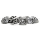 A pile of Coat of Arms Design Metal Blazer Buttons with intricate engraved patterns is displayed on a white surface, evoking classic style.