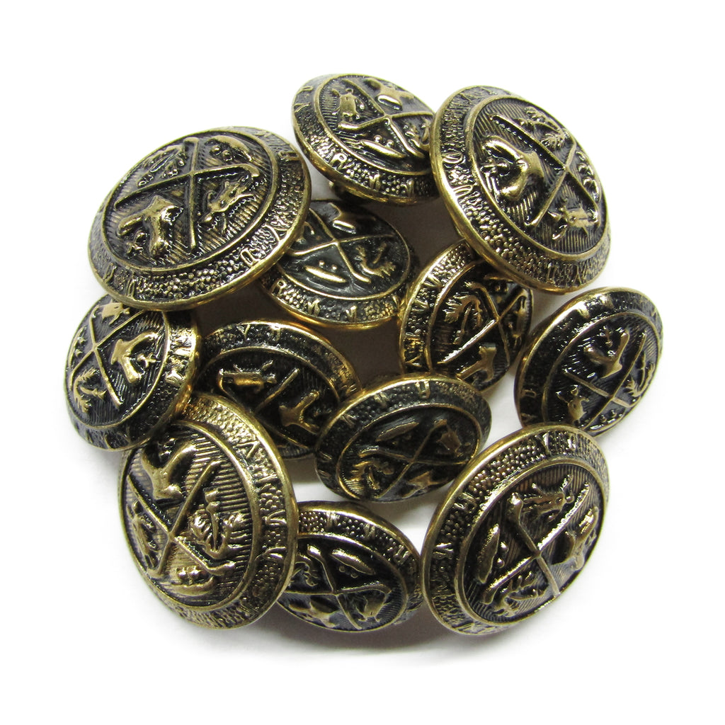 A pile of round Coat of Arms Design Metal Blazer Buttons with intricate raised patterns and dark accents, ideal for adding a vintage touch.