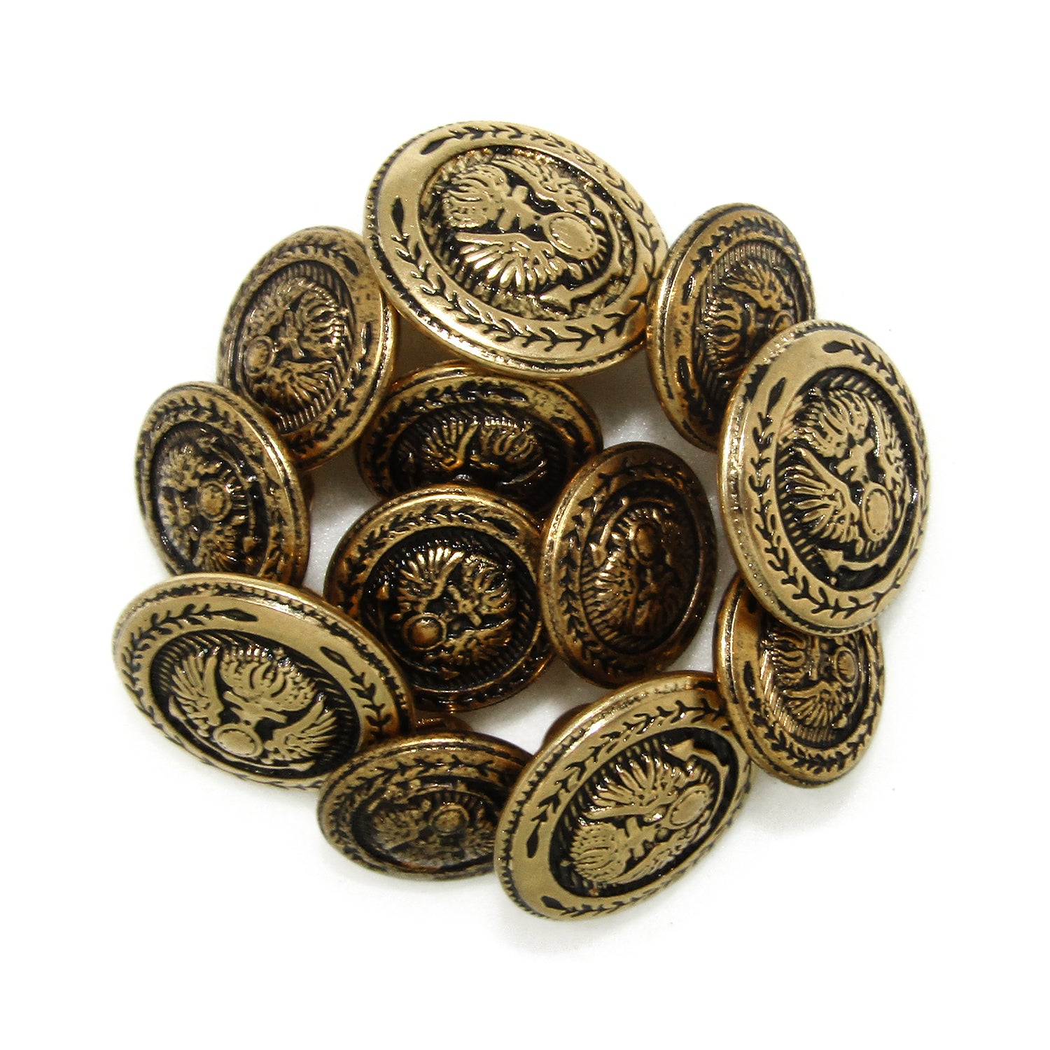 A pile of Presidential Design Metal Blazer Buttons featuring ornate, round, gold metal with black detailing and an intricate pattern.