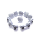 A circular row of Silk Satin Bridal Buttons with metal clips, each fabric-covered and arranged in a ring on a white background.