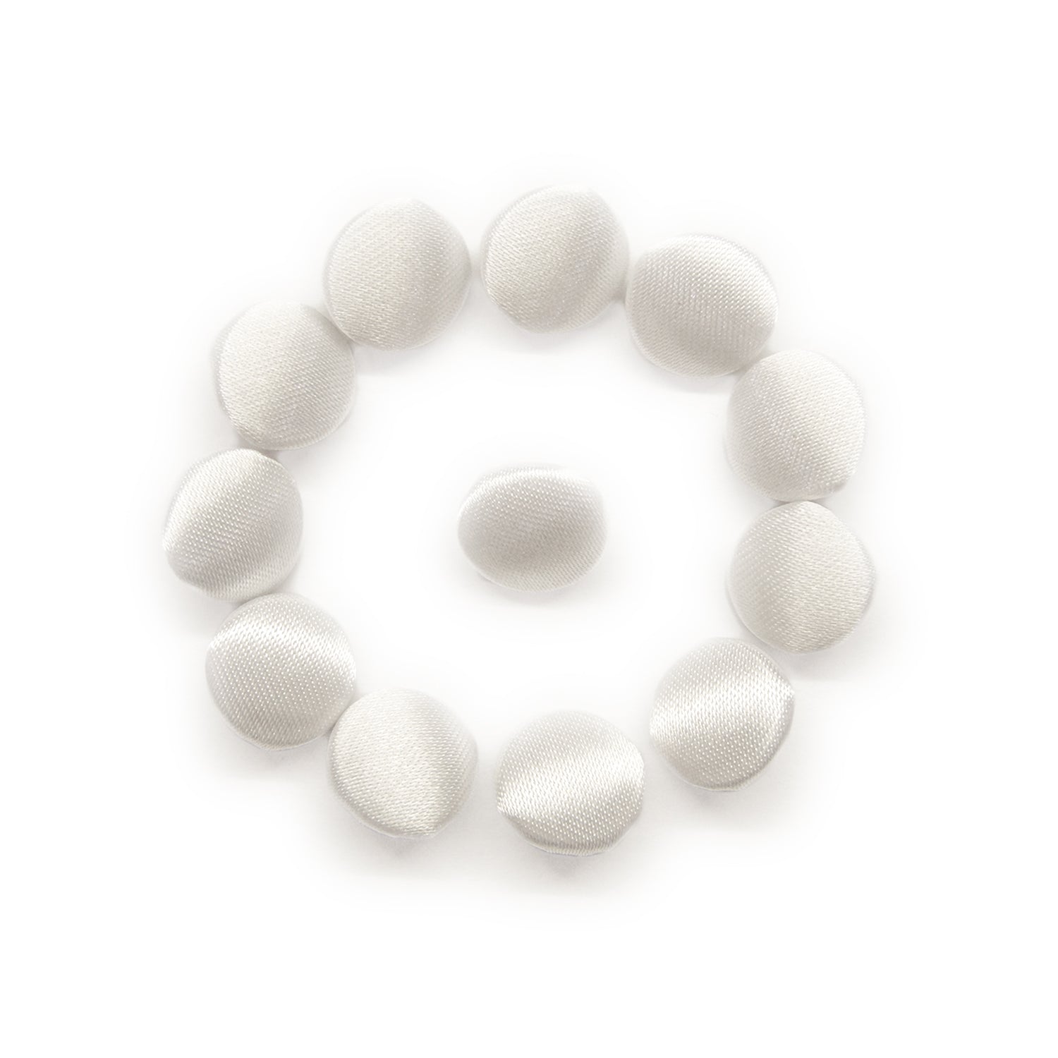 Twelve Silk Satin Bridal Buttons—eleven arranged in a circle around one—are displayed on a white background.