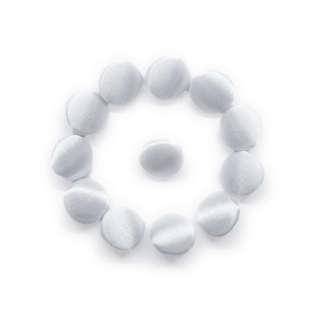 Eleven Silk Satin Bridal Buttons, white and round, are displayed in a circle with one centered on a white background—perfect as wedding dress buttons.