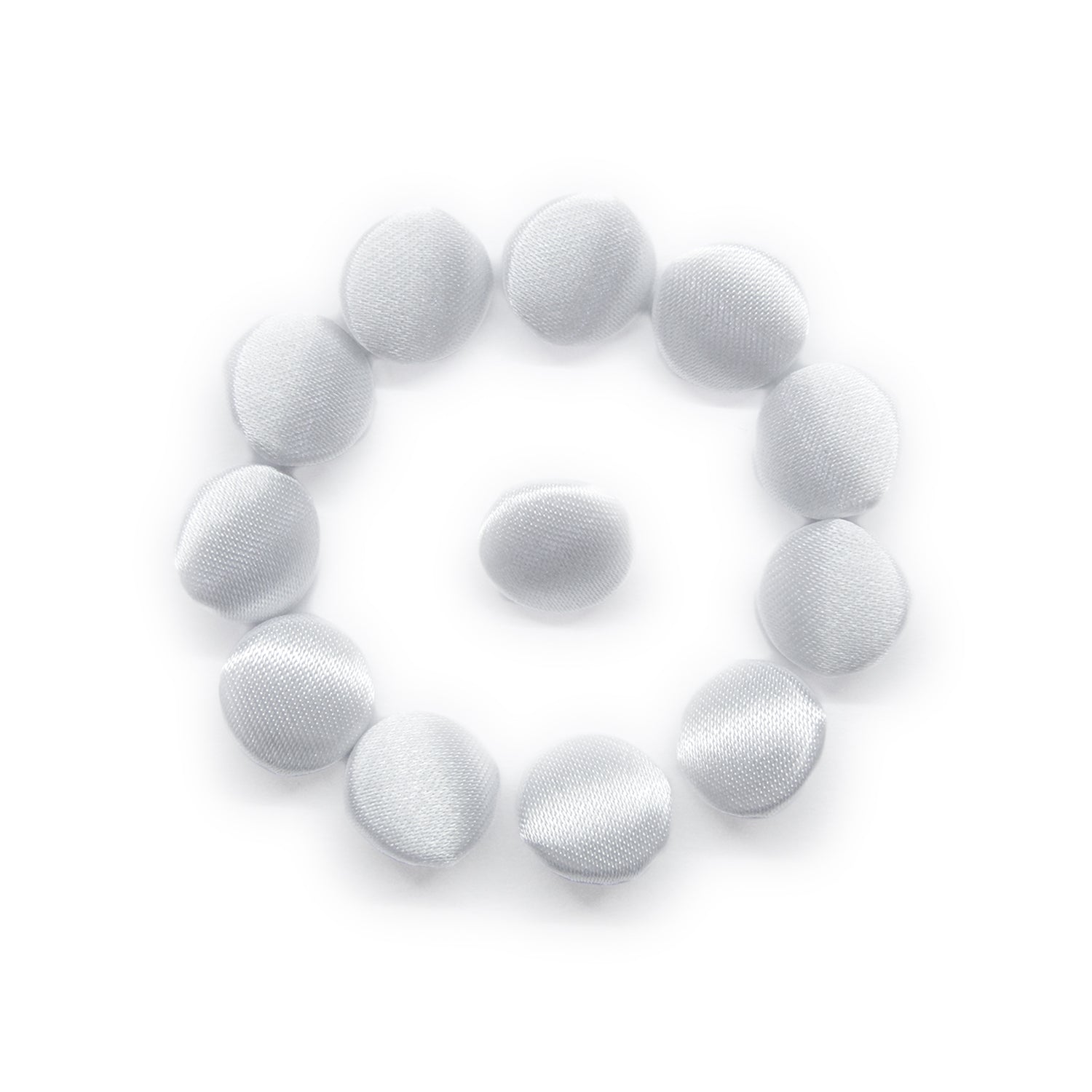 Eleven Silk Satin Bridal Buttons, white and round, are displayed in a circle with one centered on a white background—perfect as wedding dress buttons.
