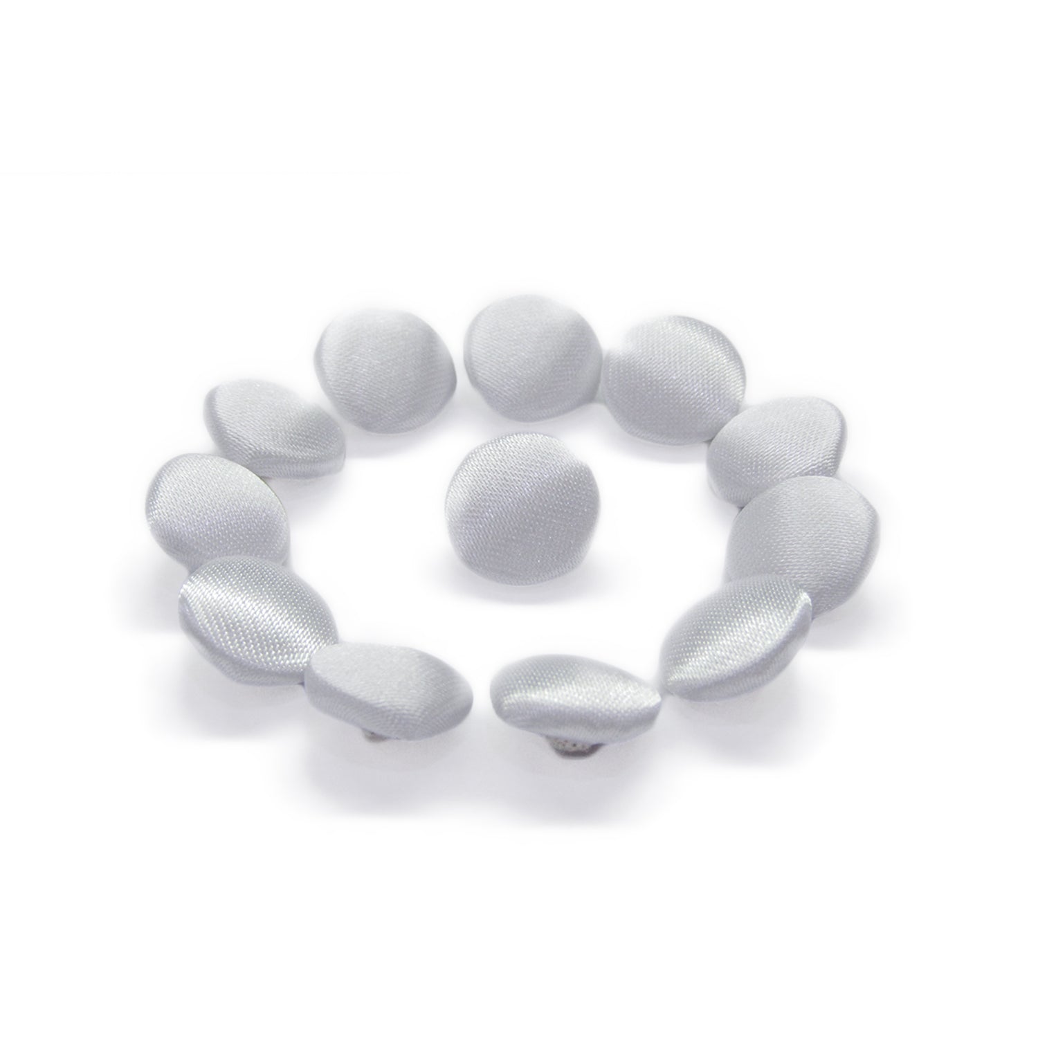 Ten Silk Satin Bridal Buttons are arranged in a circle around one button on a white background, highlighting the classic elegance perfect for bridal design.