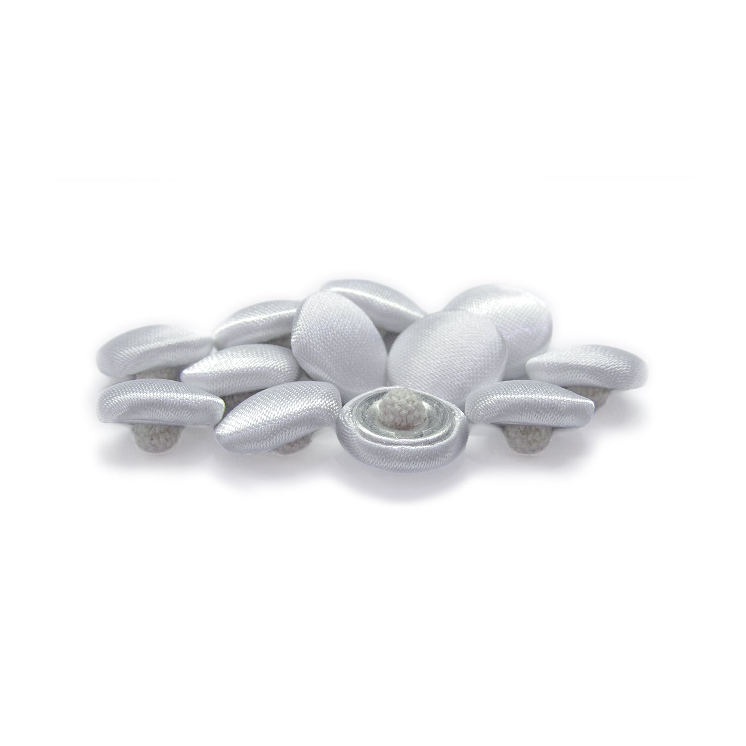 Silk Satin Bridal Buttons: a collection of smooth, oval, white buttons grouped on a white background, ideal as delicate trim for wedding dresses.