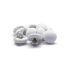 A pile of Taffeta Bridal Buttons, elegant silk fabric buttons often used for bridal attire, displayed on a white background.