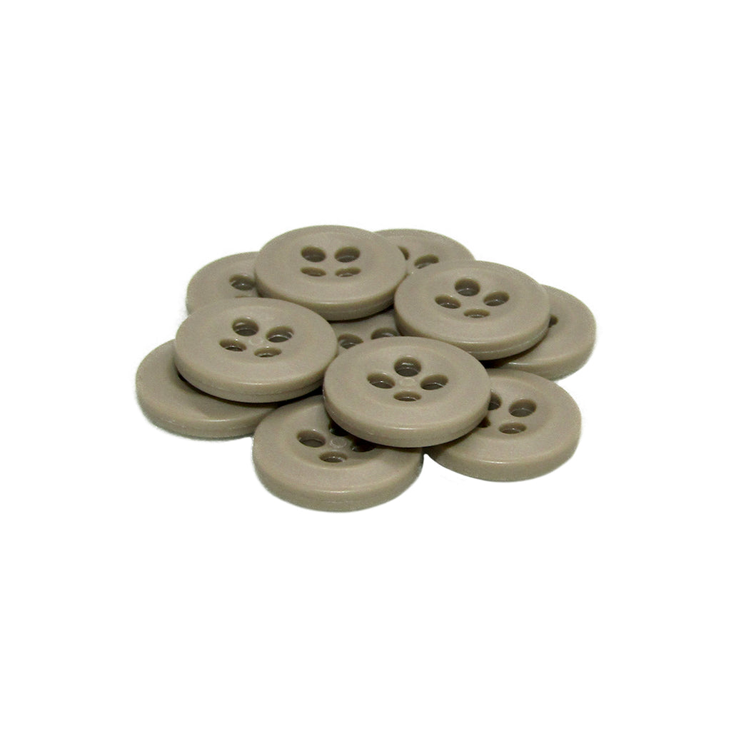 A stack of round, beige Uniform Shirt Buttons made of melamine, typically used for uniform shirts, neatly arranged on a white background.