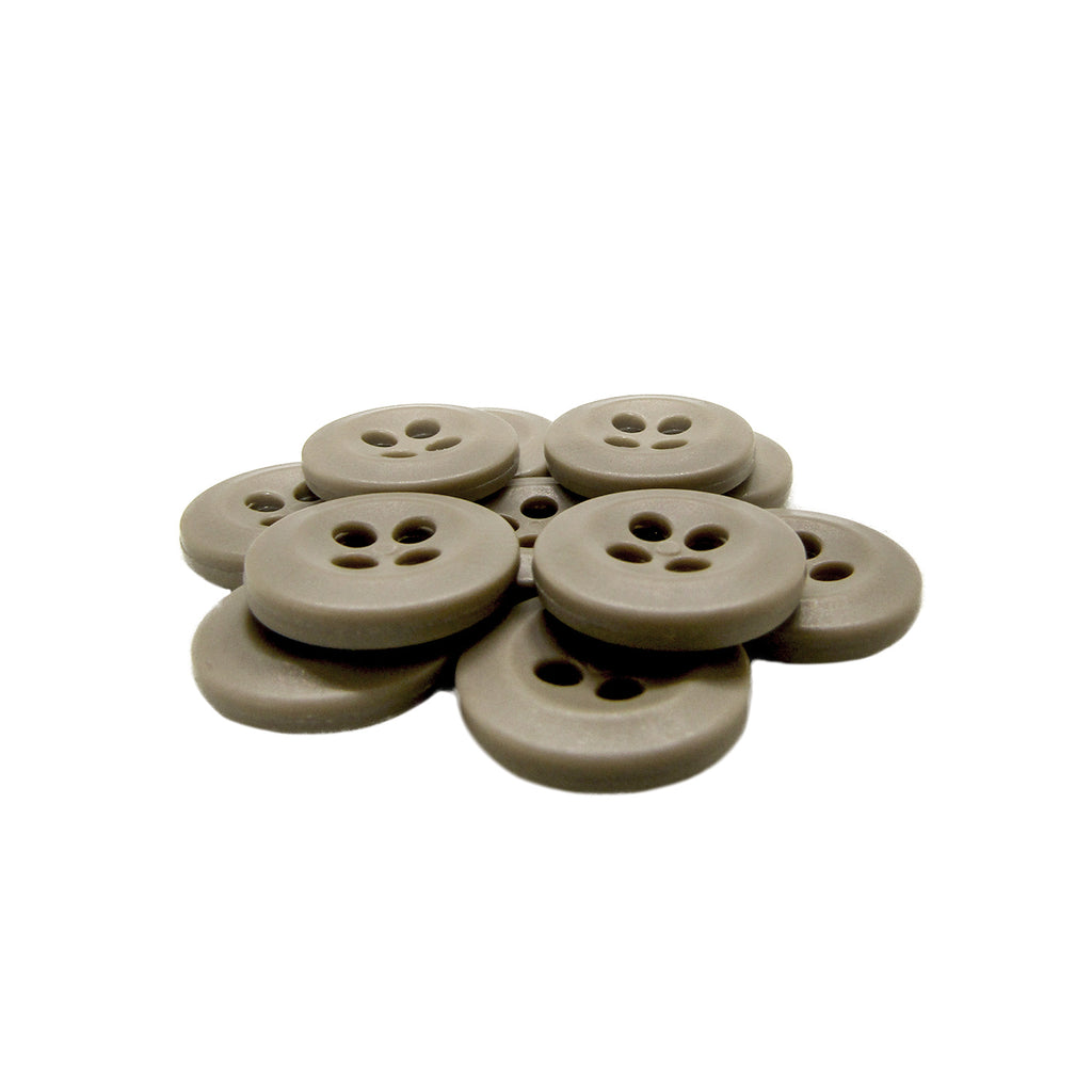 A pile of round, beige Uniform Shirt Buttons with four holes rests on a white background.