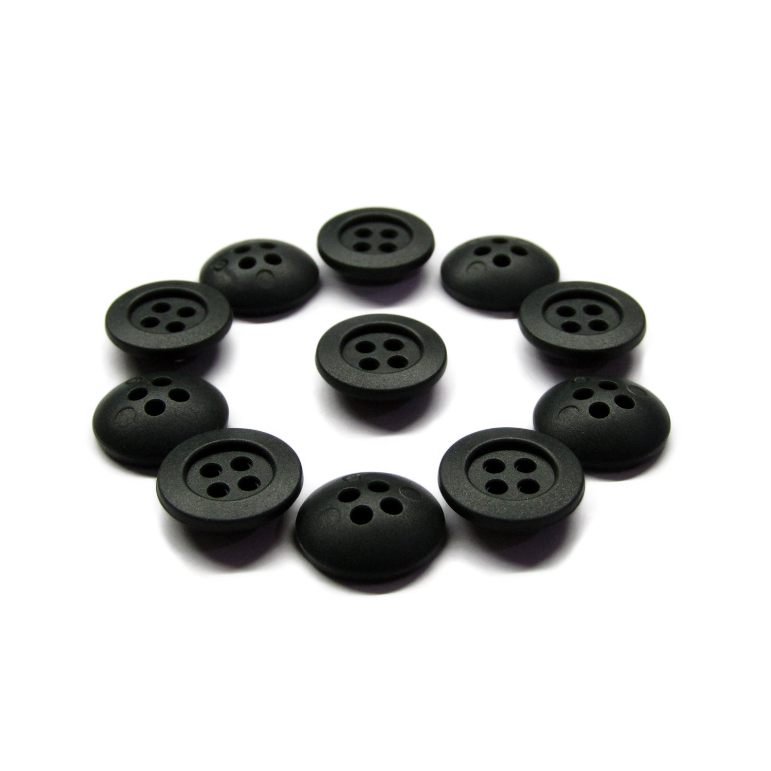Ten black Rubber Shirt Buttons, each scratchproof with four holes, are arranged in a neat circle on a white background—perfect for children's clothing.