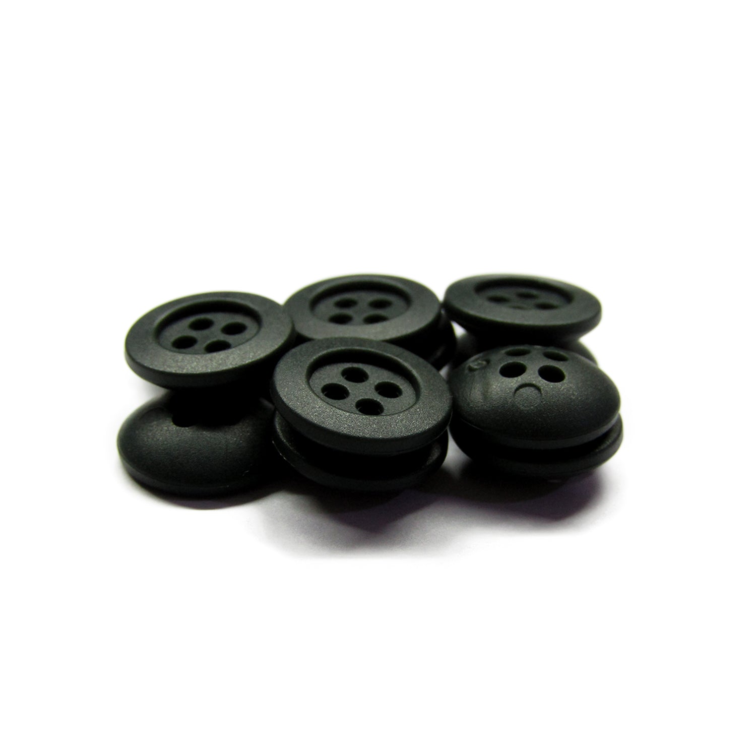 Six black Rubber Shirt Buttons with four holes and a scratchproof finish, displayed on a white background—ideal for children's clothing projects.