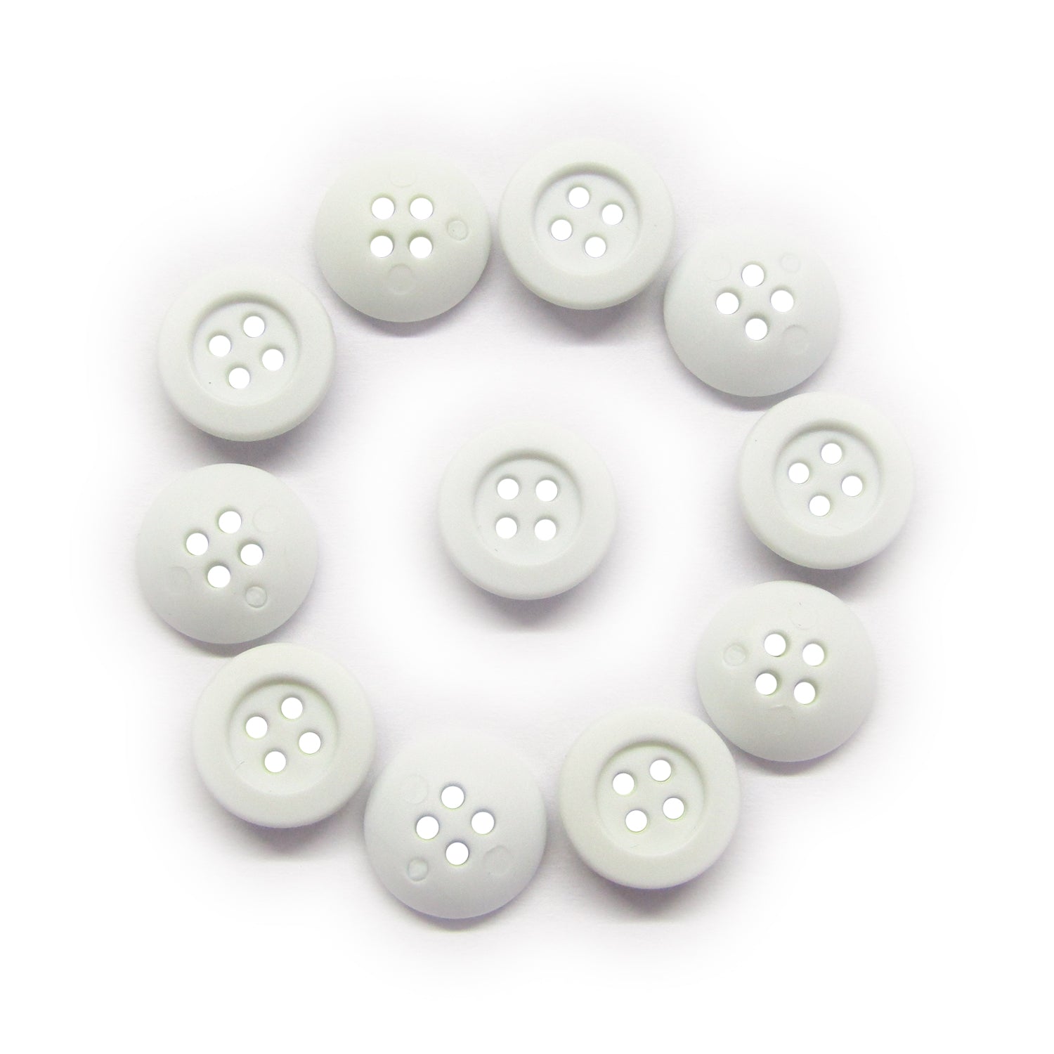 Eleven Rubber Shirt Buttons, ideal for children's clothing, are arranged in a circle on a white background.