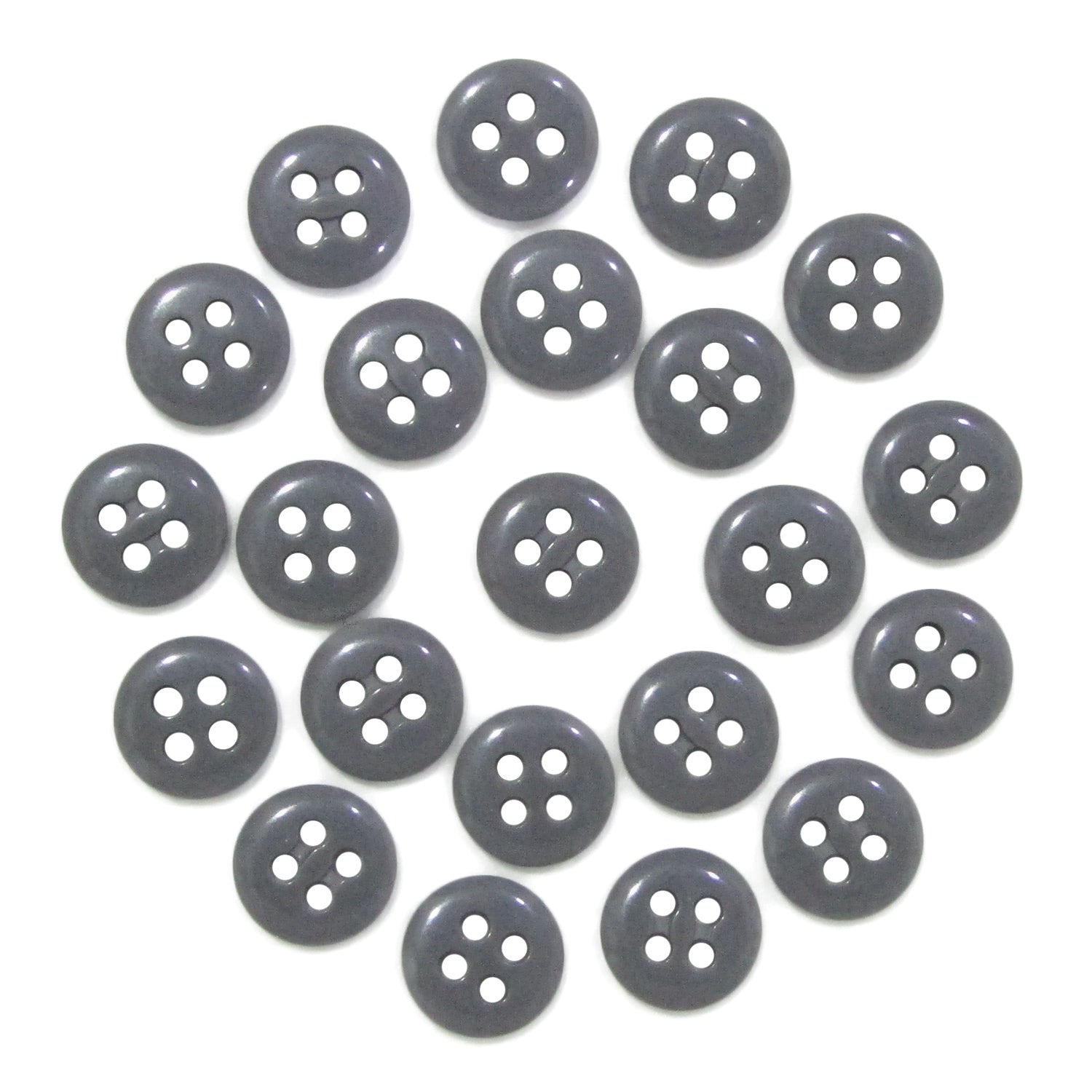 Twenty Trouser Fly Pant Buttons, each black with four holes, are arranged in a circle on a white background.