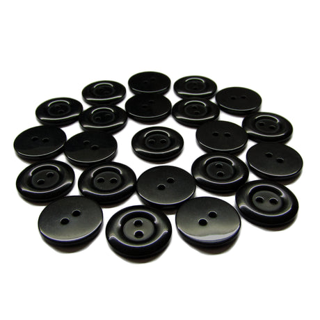 Several black round Commercial Food Service Buttons, each with two holes, are neatly arranged in a semicircle on a white background.