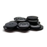 A pile of black, round Commercial Food Service Buttons with two holes each—perfect as plain uniform buttons—set against a white background.